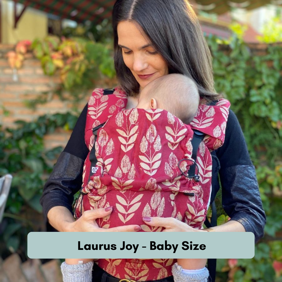 Neko Switch Trage mit verstellbarem Rückenpanel und gepolsterten Schultergurten. Laurus Joy Babysize