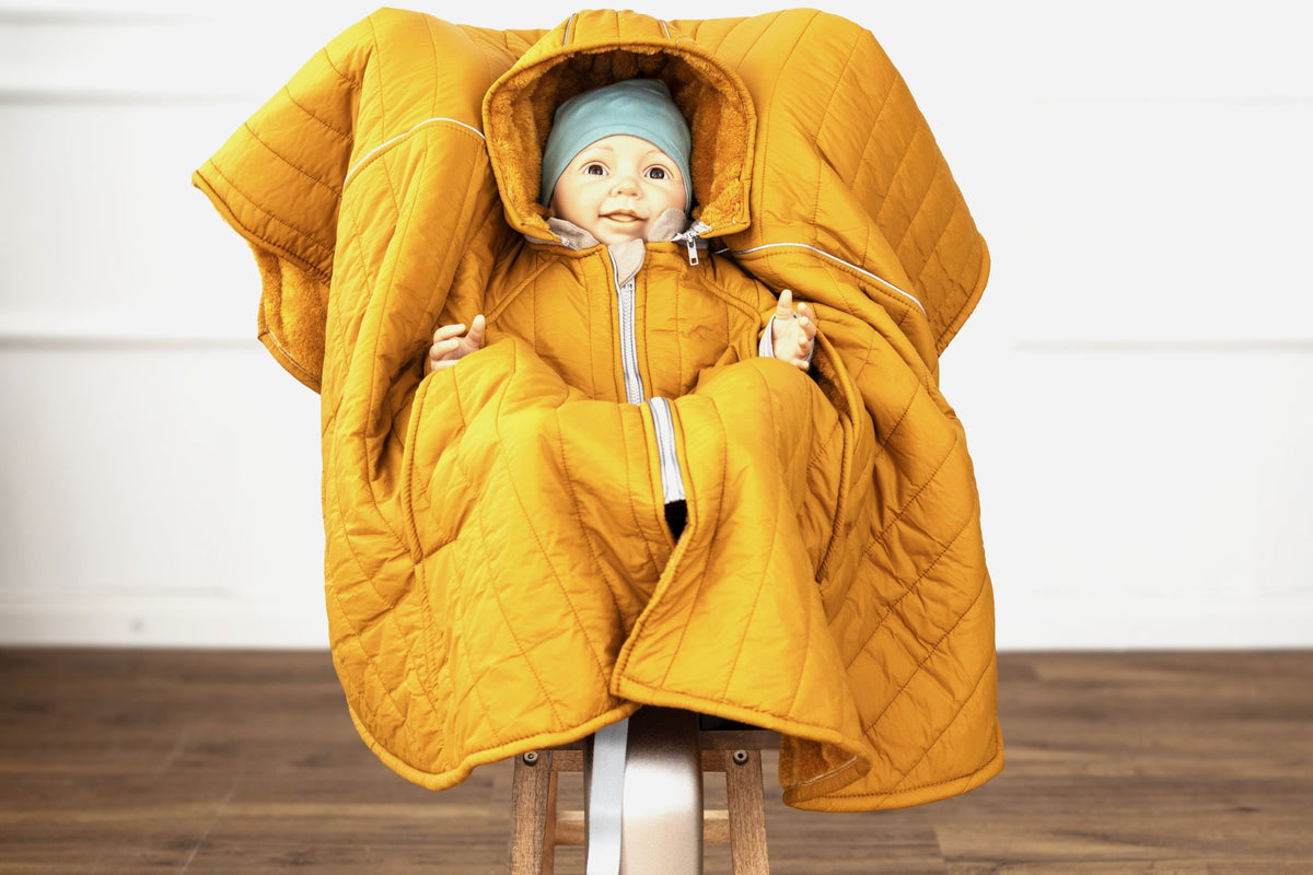 XL Kindersitzponcho Stepp Senfgelb geschlossen